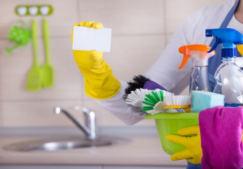 Carpet cleaning team preparing equipment with safety focus